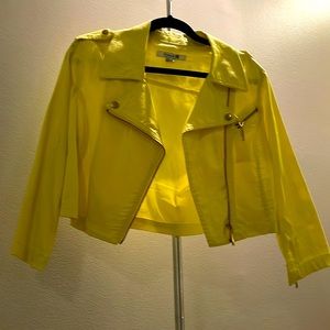 Yellow short jacket with gold details in very good condition.